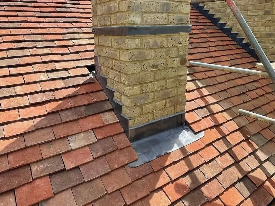 Lead flashings to a newly built chimney